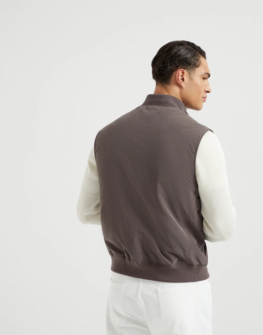 Water-resistant microfiber vest with Thermore® padding and knit inserts