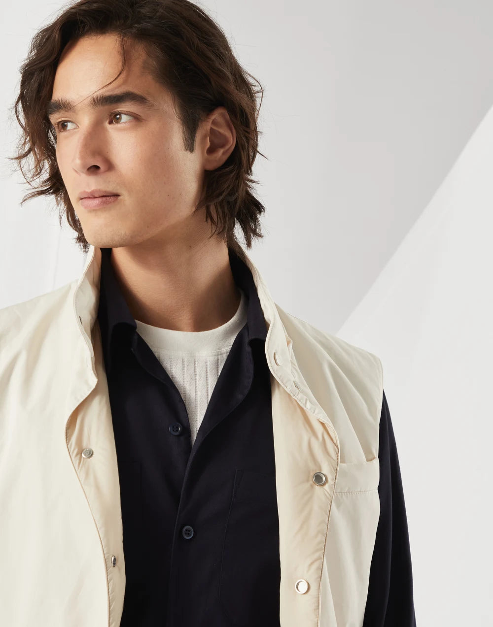Water-resistant microfiber vest with Thermore® padding and detachable hood
