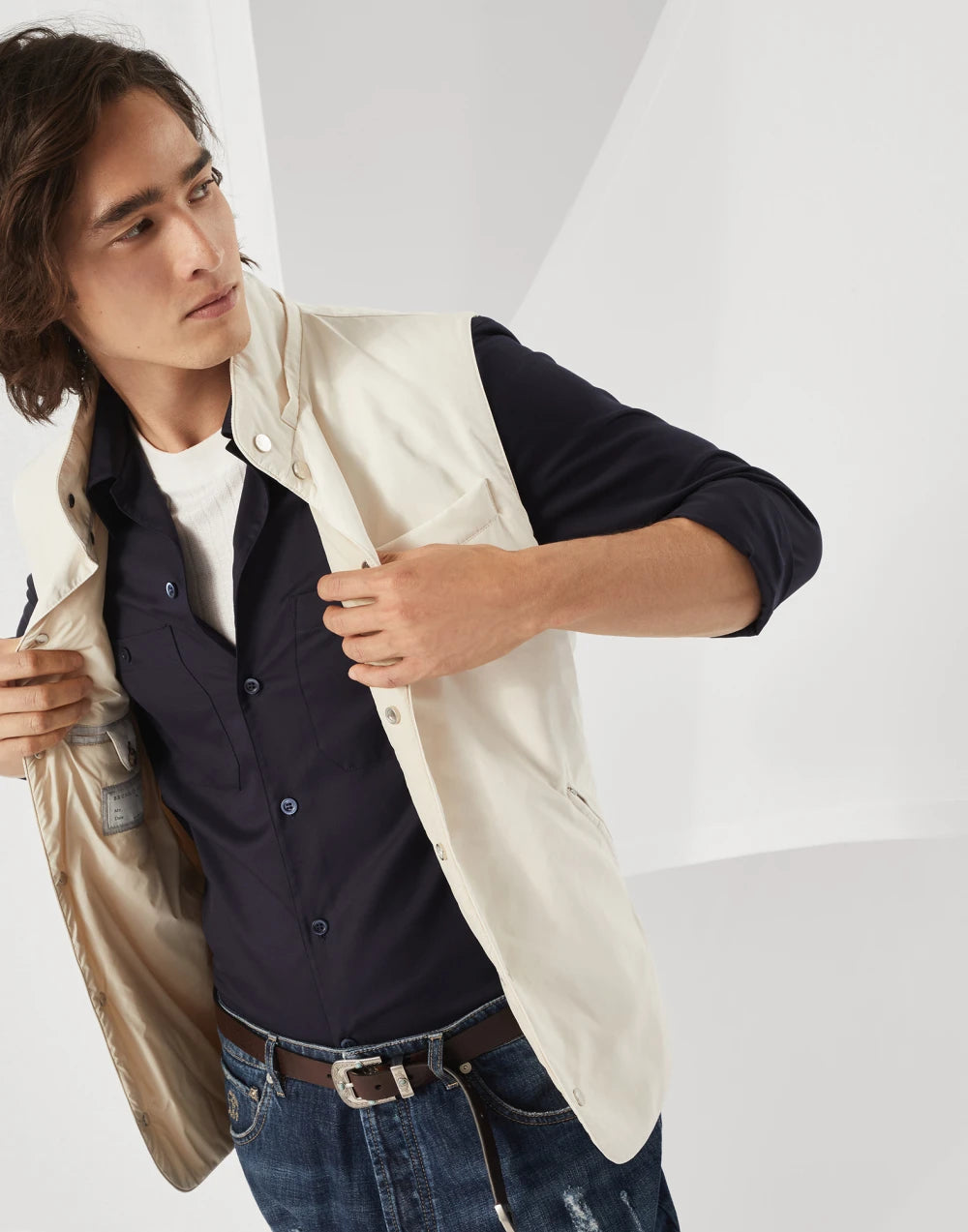 Water-resistant microfiber vest with Thermore® padding and detachable hood