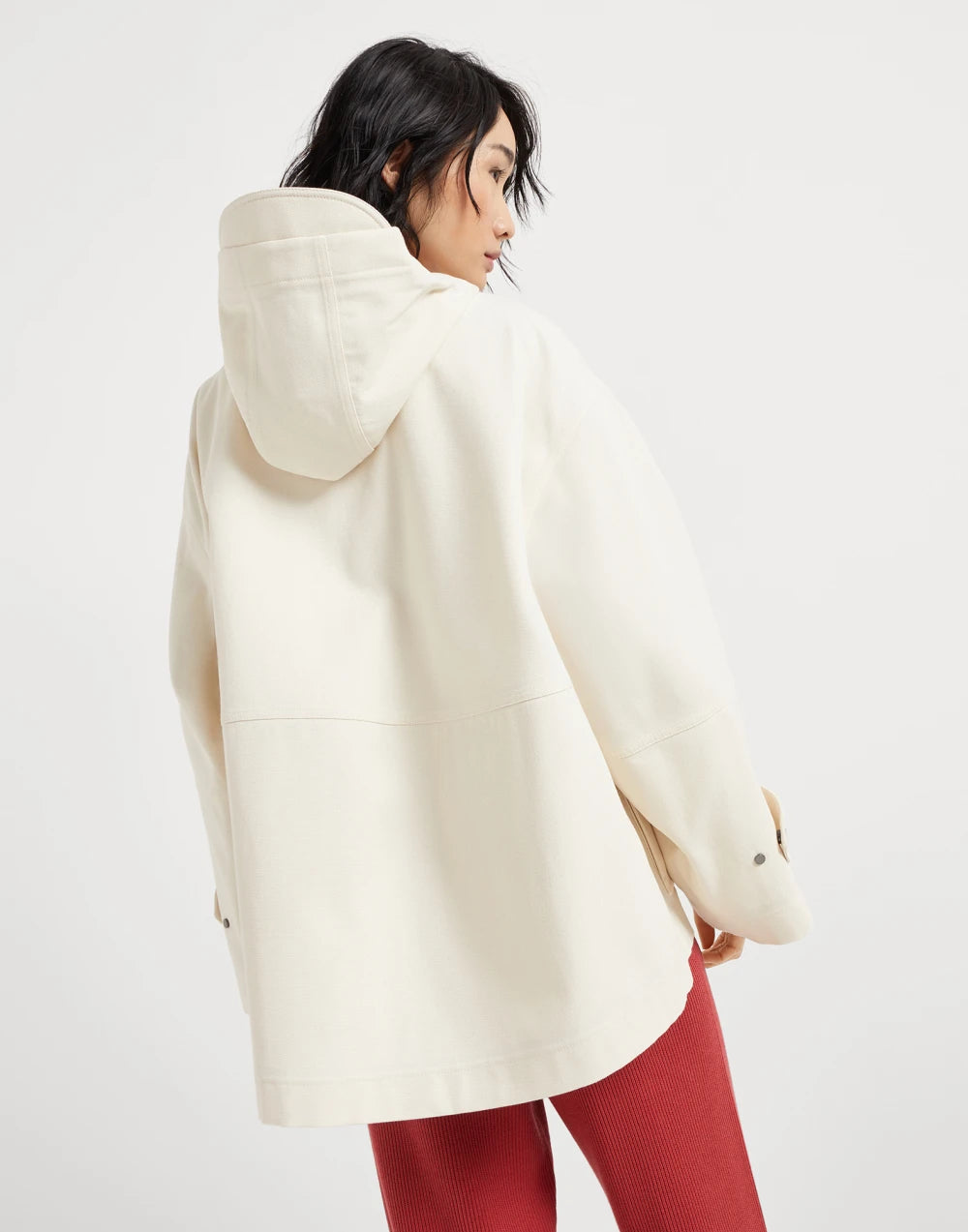 Water-resistant cotton canvas hooded outerwear jacket with heat-bonded seams and shiny zipper pull