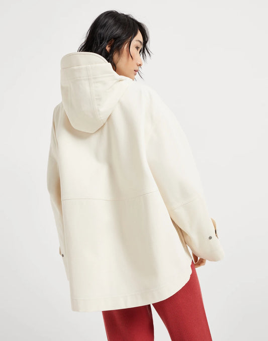 Water-resistant cotton canvas hooded outerwear jacket with heat-bonded seams and shiny zipper pull