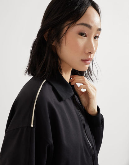 Couture interlock sweatshirt with zipper, piping and monili